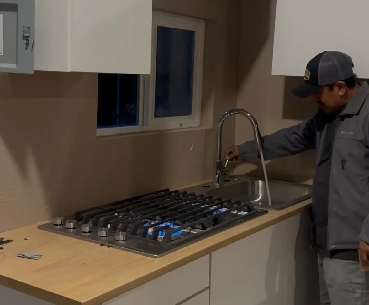 Employee using a time clock to record work hours